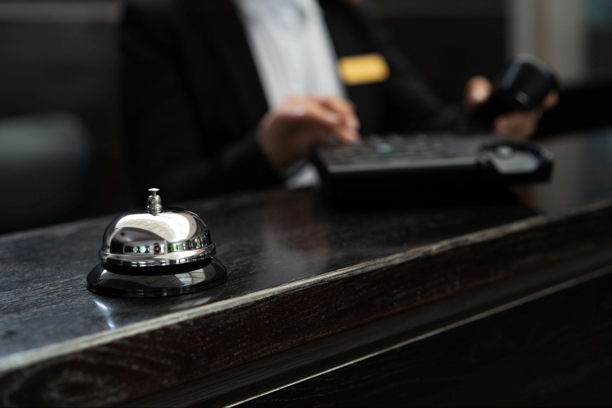 A hotel receptionist at the desk