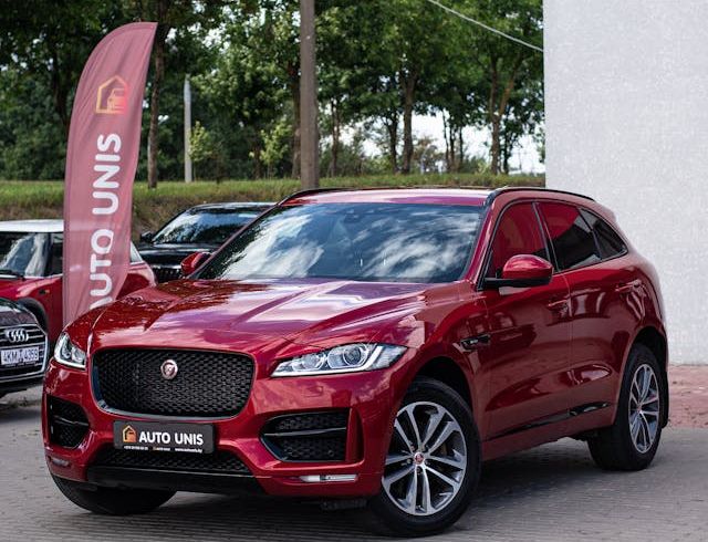Jaguar F-Pace parked in front of a building